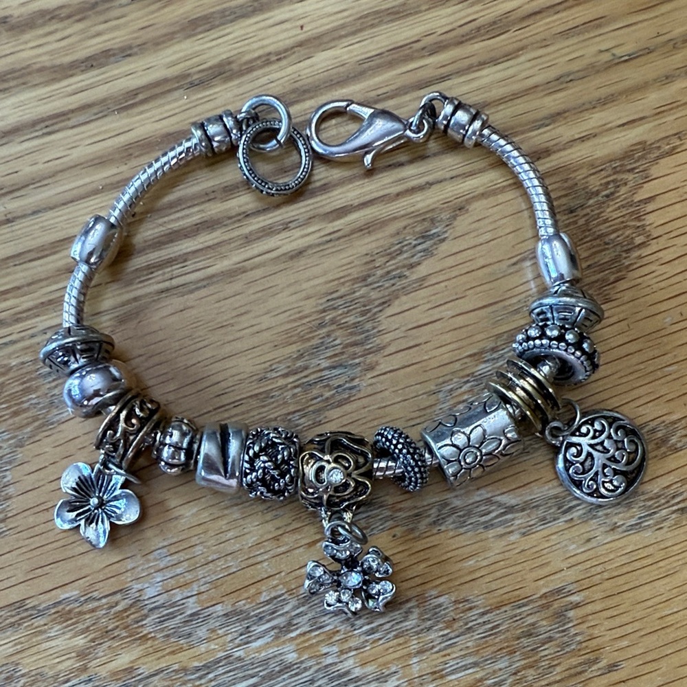 Elegant Silver and Gold Charm Bracelet